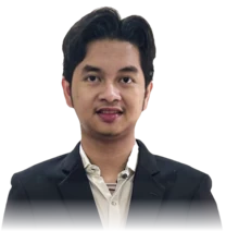 Eryawan Presma Yulianrifat, head and shoulders, dark blazer over a pale shirt, cut out against the panel